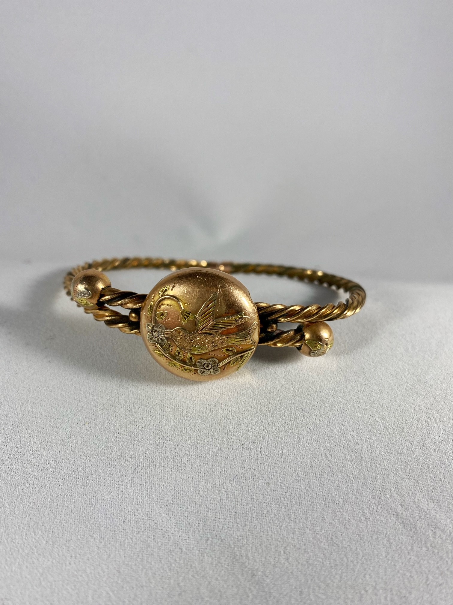 Lot 703: Copper Colored Bangle with Hummingbird